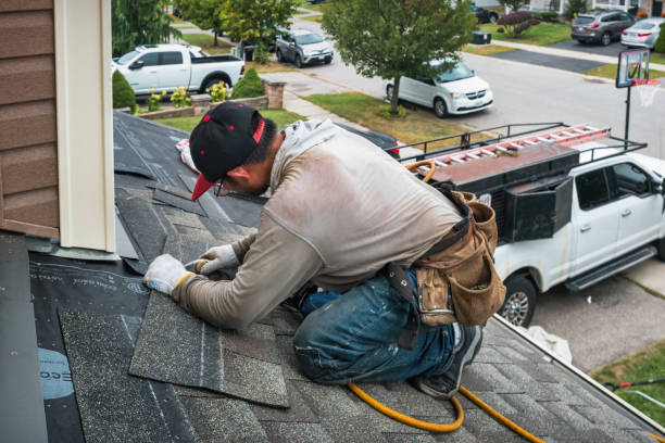 Professional Roofing technician working in Palisades, NY